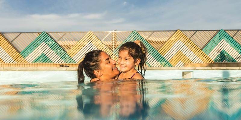 Woman and girl in a hot pool